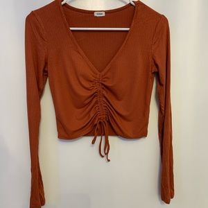 Orange “Garage” Long Sleeve Crop Top